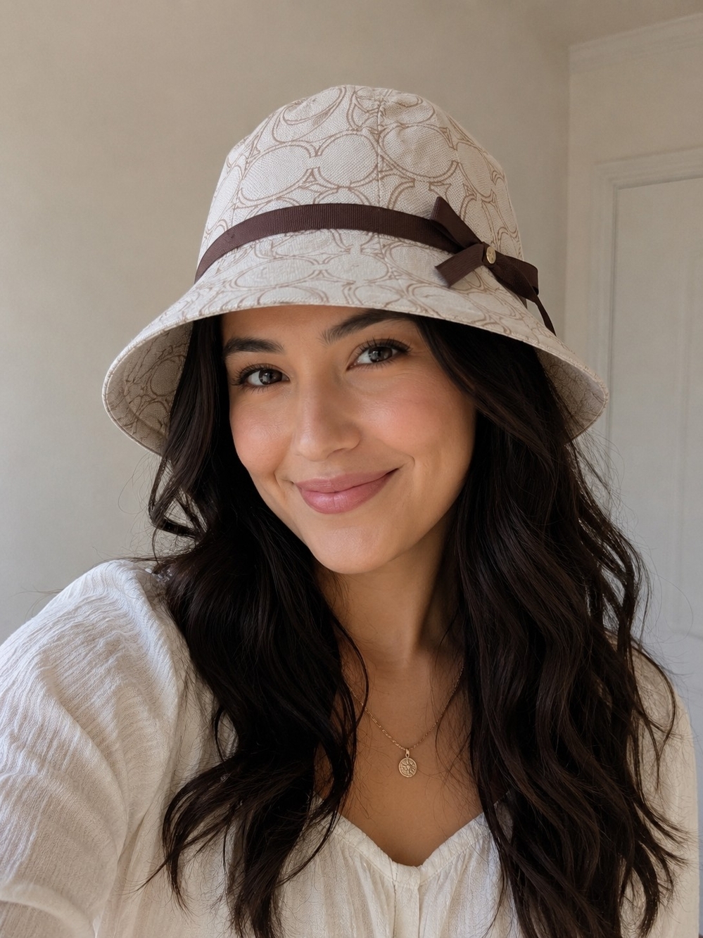Coach Cream Monogram Bucket Hat with Brown Ribbon